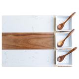 charcuterie board with sauce bowls and spoons
